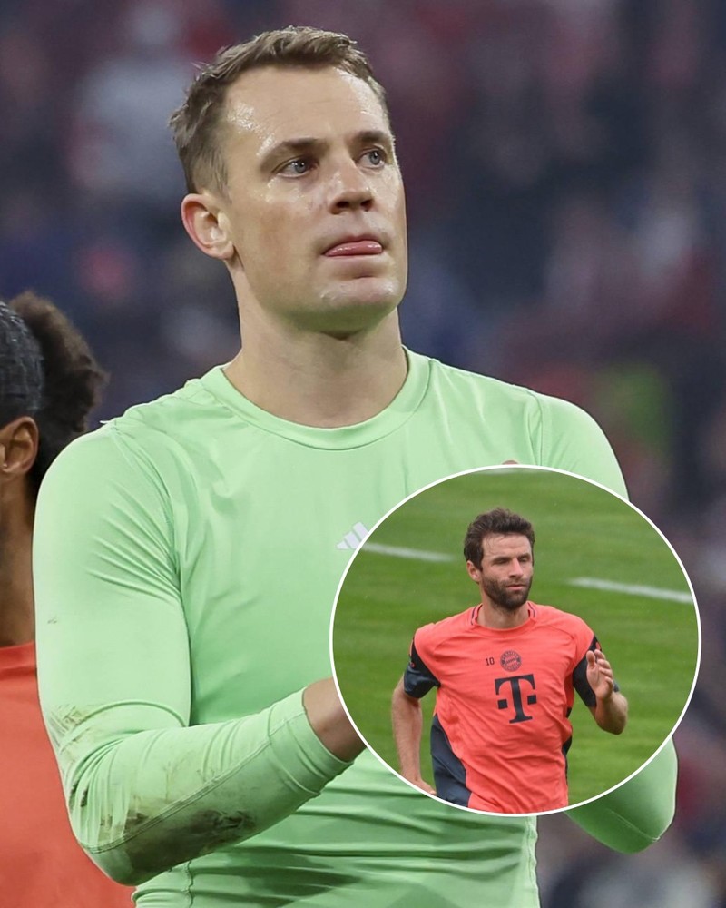 Manuel Neuer drückt Thomas Müller einen Spruch im Interview.